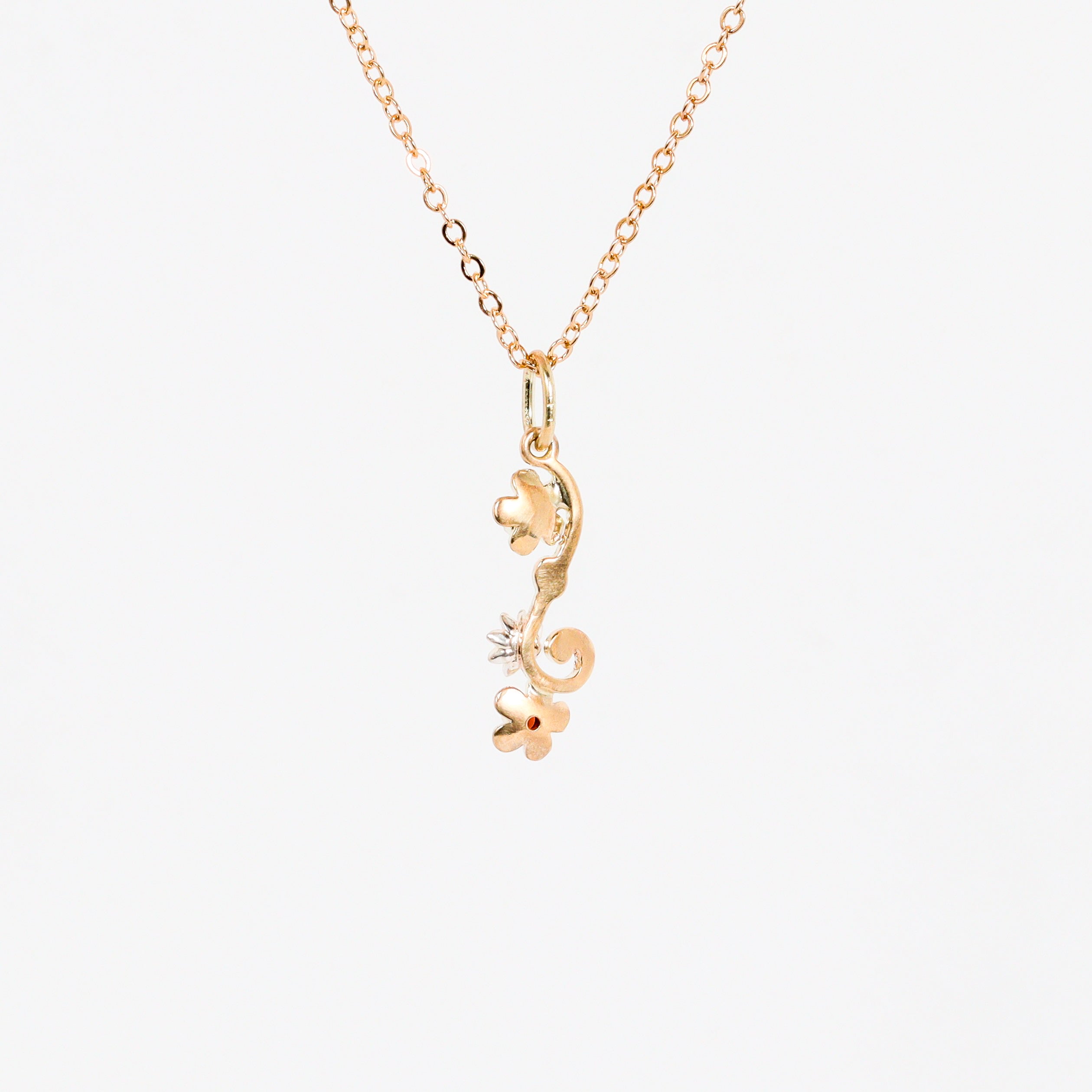 Leon Baker - 9kyg & Silver Wildflower Garnet & Pink Sapphire Pendant